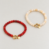 Armband van beige kralen-goud