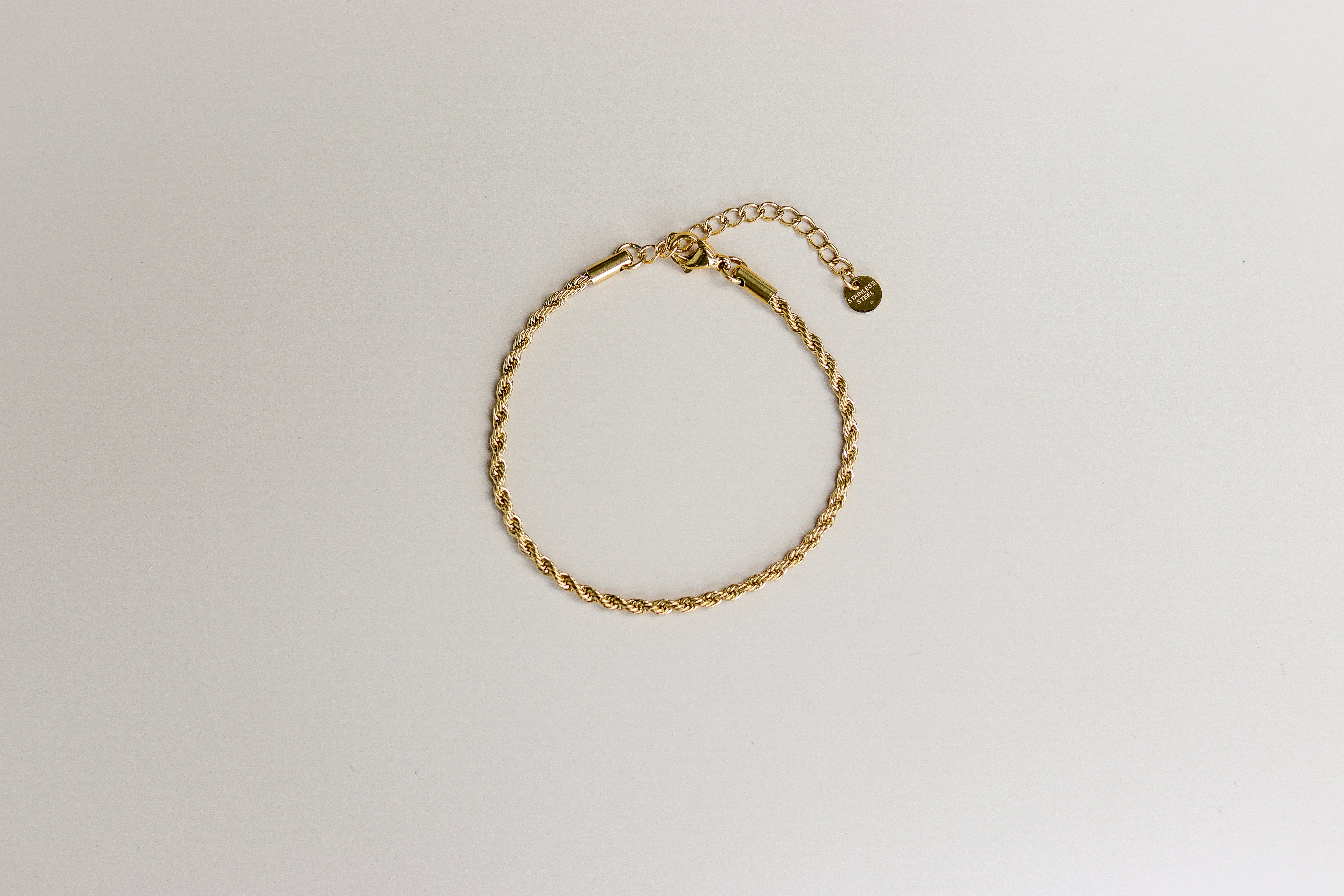 Gouden gedraaide armband met verlengstukje