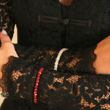 Armband van beige kralen-goud