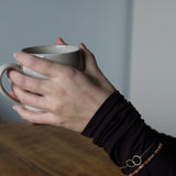 Armband van roestbruine kralen-goud