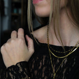 Armband met beige kraaltjes- goud