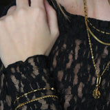 Armband met beige kraaltjes- goud