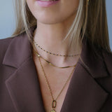 Ronde bedel met hart-goud