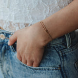 Dubbele armband met klein open hartje-goud