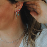 Turquoise ronde kraaltjes kort-zilver