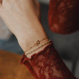 Armband plat gedraaid-goud