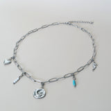 Knijpbedel maan met strass steentje-zilver