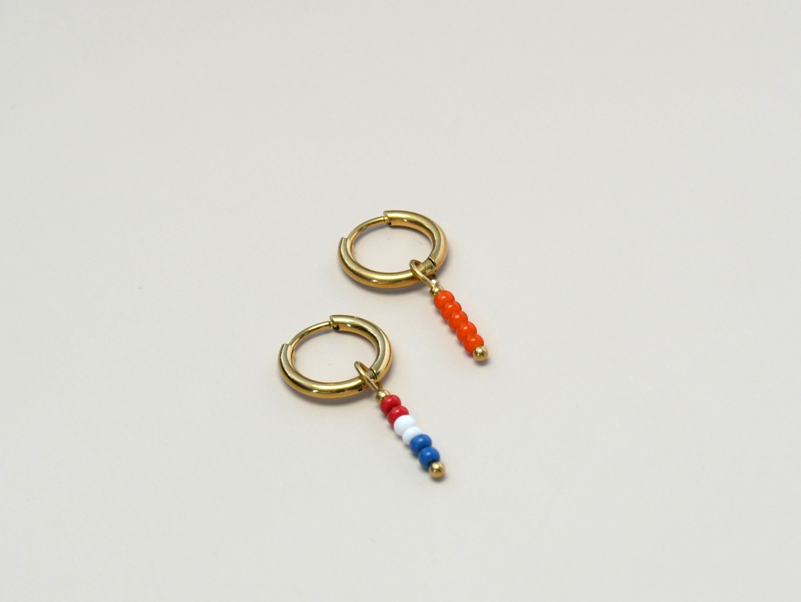 Rood,wit,blauwe ronde kraaltjes Kingsday-goud