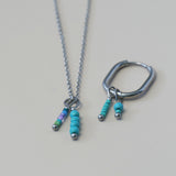 Turquoise ronde kraaltjes lang-zilver