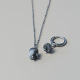 Zwart witte natuursteen disc-zilver