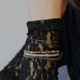 Armband van groene kralen-goud