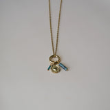 Ronde bedel met hart-goud