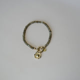 Armband van groene kralen-goud