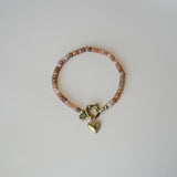 Armband van roestbruine kralen-goud