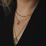 Ketting met zwarte bolletjes-goud